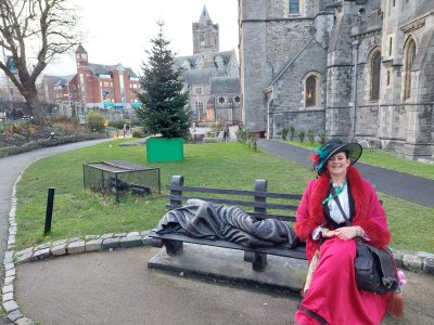 dalton's musical history tour  tour guide seated outside of christ church cathedral
