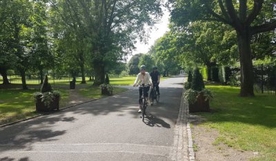 Mybikeorhike Cycling City Tour a woman cycling in a park