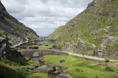 The Gap of Dunloe Tourism Ireland stone bridge with rocky and green landscape
